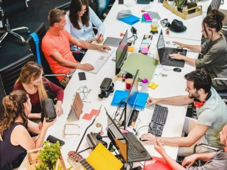 Happy-people-planning-a-new-project-in-creative-workplace-office