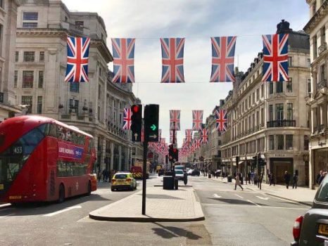 Union-Jacks-above-vehicles-on-Regent-Street-in-summer-London-UK